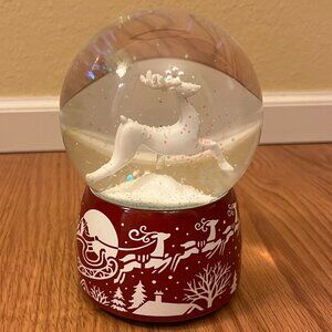 Santa reindeer sleigh musical glitter red white Christmas snow globe